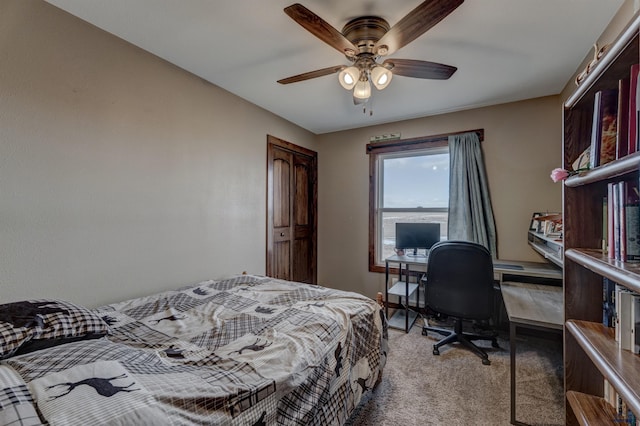 carpeted bedroom with ceiling fan