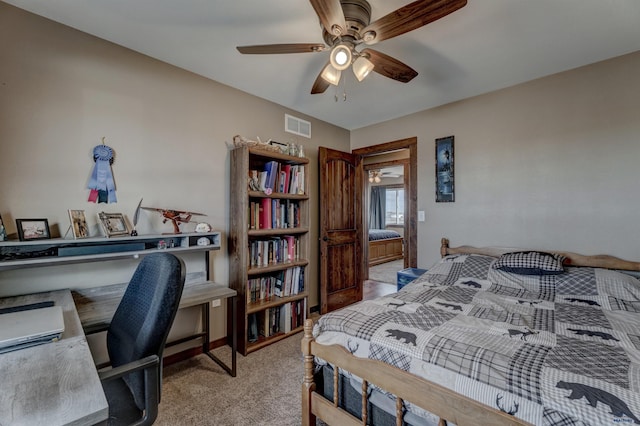 bedroom with light colored carpet and ceiling fan