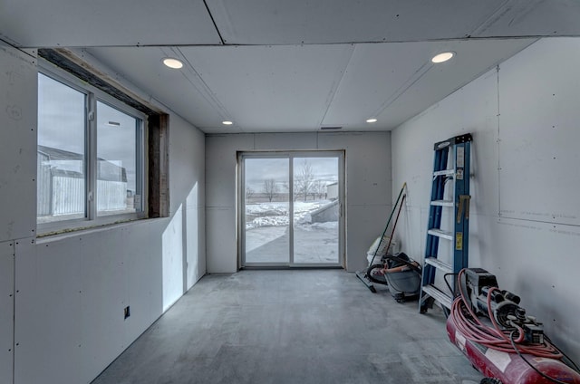 spare room with plenty of natural light