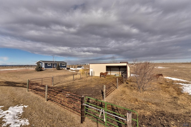 exterior space with a rural view