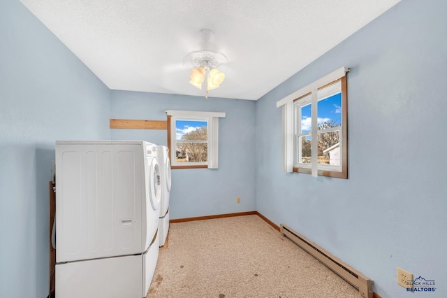 washroom with separate washer and dryer, light carpet, and baseboard heating