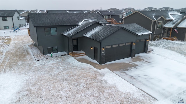 view of front of property featuring a garage