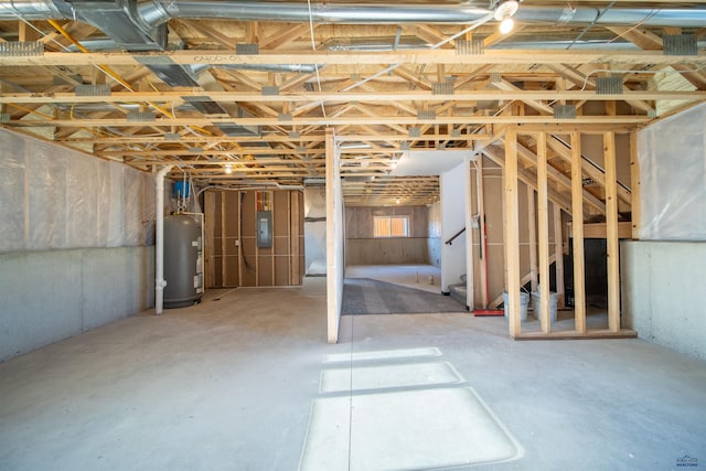 basement with gas water heater and electric panel