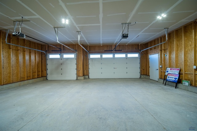 garage featuring a garage door opener