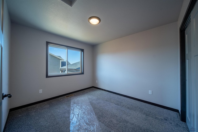 unfurnished bedroom featuring carpet