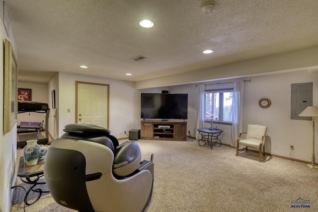 living room featuring carpet flooring and a textured ceiling