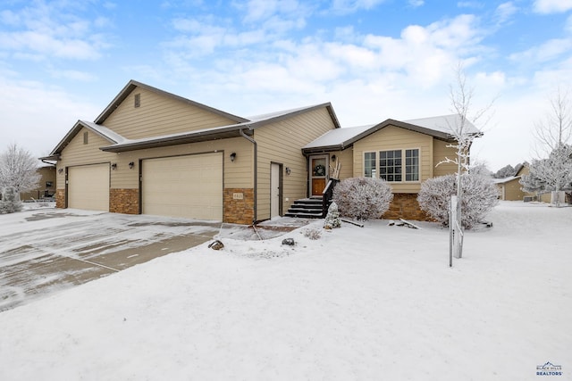 ranch-style home with a garage