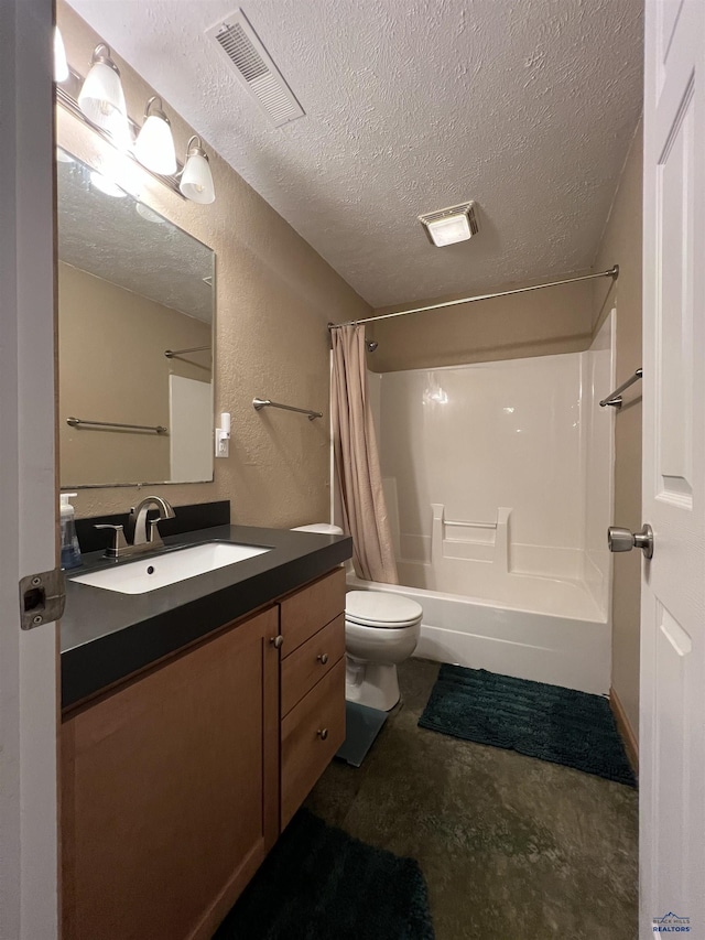 full bathroom with shower / tub combo with curtain, vanity, toilet, and a textured ceiling