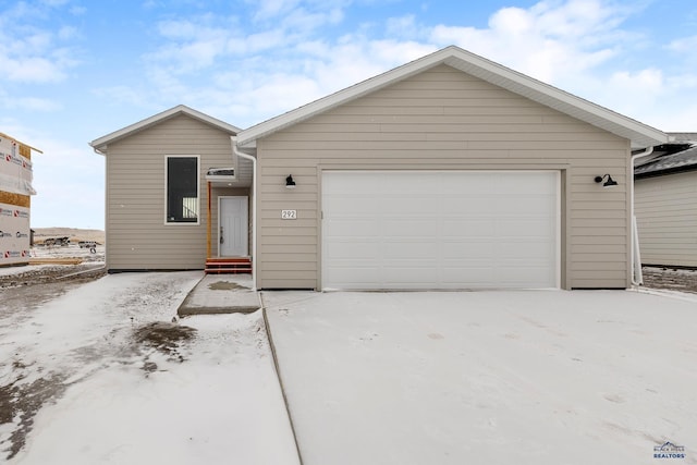 ranch-style home with a garage