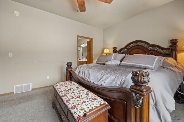 bedroom featuring ceiling fan, ensuite bathroom, and carpet flooring