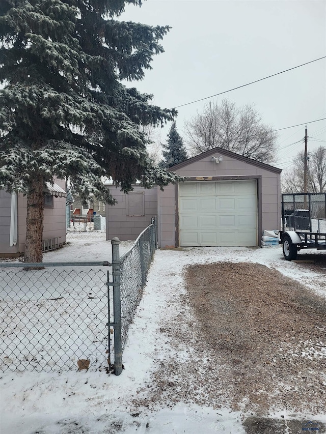 view of snow covered garage