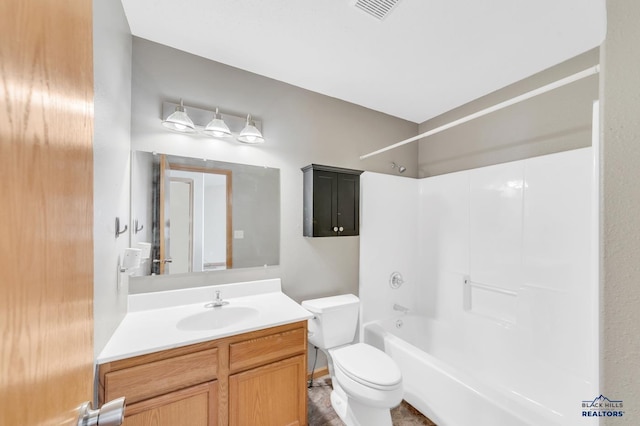 full bathroom with vanity, shower / washtub combination, and toilet