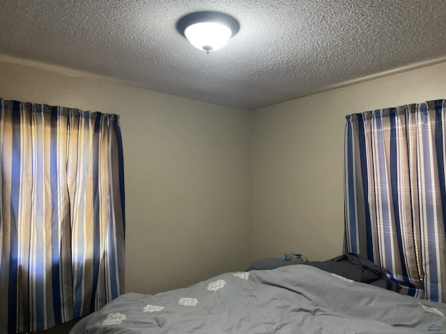 unfurnished bedroom featuring a textured ceiling