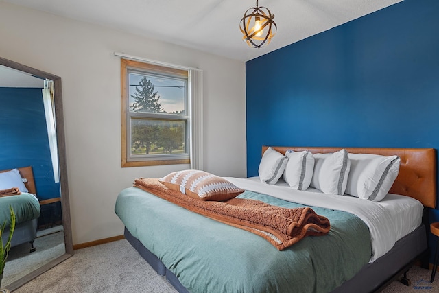 bedroom featuring light carpet