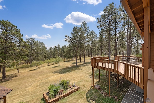 view of yard featuring a wooden deck