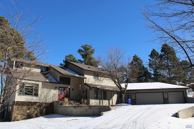 view of front of property featuring a garage