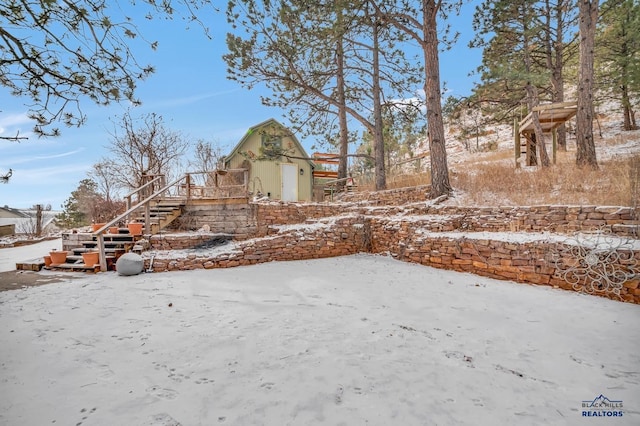 view of yard covered in snow