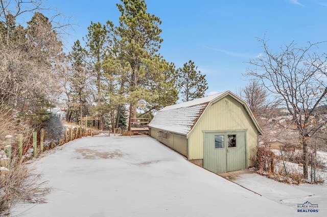 view of snow covered garage