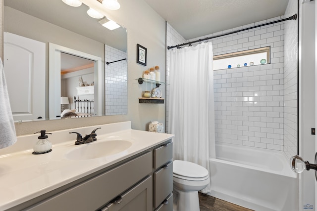 full bathroom featuring vanity, toilet, shower / tub combo, and hardwood / wood-style floors