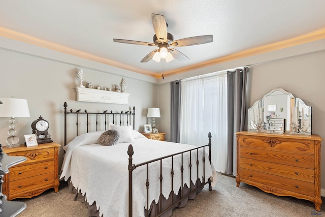 bedroom with light colored carpet and ceiling fan