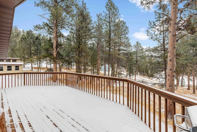 view of snow covered deck