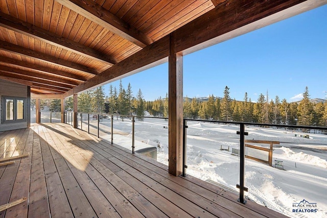 view of snow covered deck