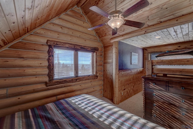 bedroom with wood ceiling, lofted ceiling, and log walls