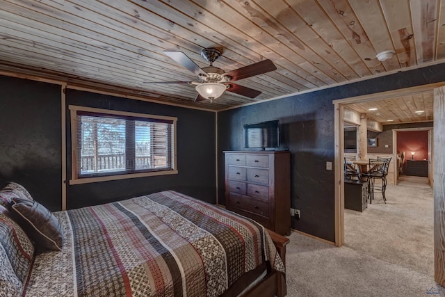 bedroom featuring crown molding, ceiling fan, carpet flooring, and wooden ceiling