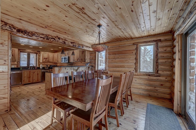 dining room featuring log walls, light hardwood / wood-style flooring, and wooden ceiling