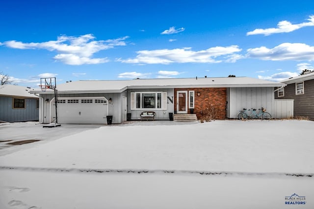 ranch-style home with a garage