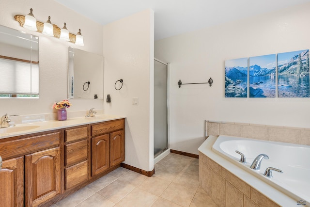 1021 Alta Vista Dr, Rapid City, SD 57701 - bathroom featuring a garden tub, a shower stall, tile patterned floors, and double vanity