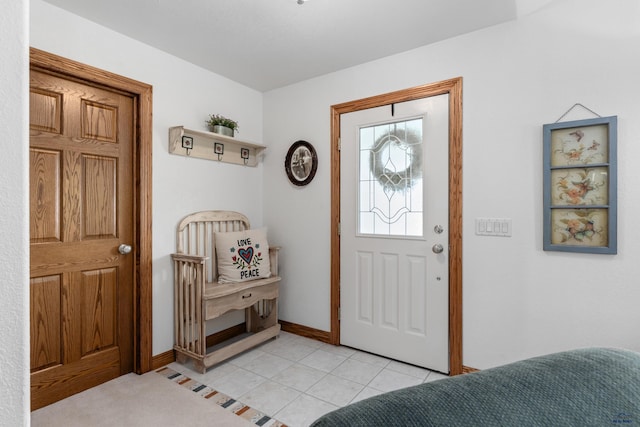 1021 Alta Vista Dr, Rapid City, SD 57701 - foyer entrance featuring baseboards and light tile patterned floors