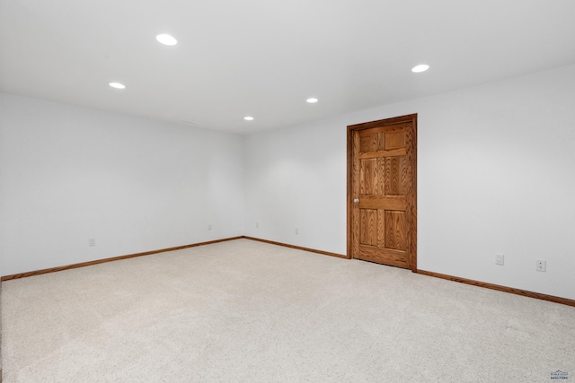 1021 Alta Vista Dr, Rapid City, SD 57701 - empty room featuring light colored carpet, recessed lighting, and baseboards