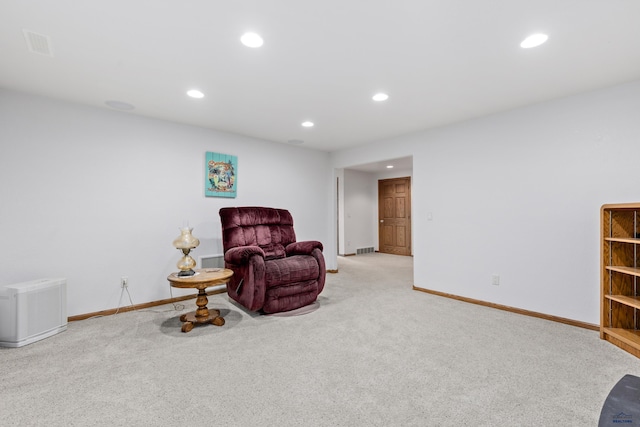 1021 Alta Vista Dr, Rapid City, SD 57701 - living area featuring light colored carpet, baseboards, and recessed lighting