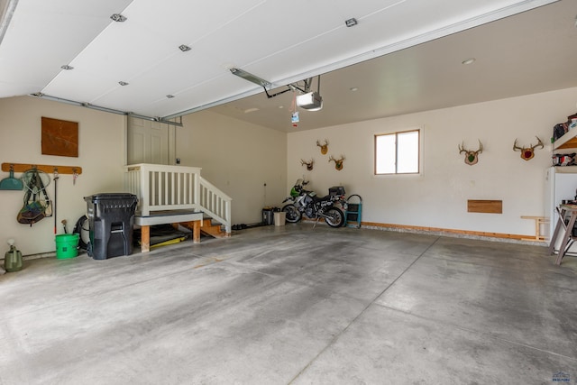 1021 Alta Vista Dr, Rapid City, SD 57701 - garage featuring a garage door opener