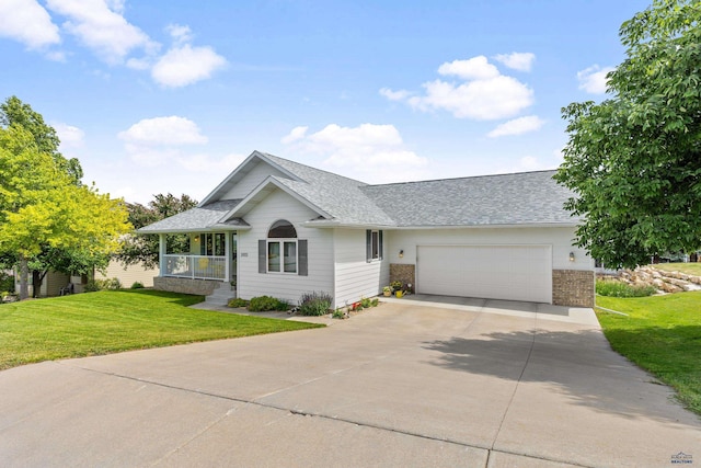 1021 Alta Vista Dr, Rapid City, SD 57701 - view of front facade featuring an attached garage, driveway, roof with shingles, and a front lawn