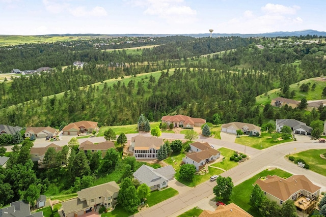 1021 Alta Vista Dr, Rapid City, SD 57701 - aerial perspective of suburban area with a heavily wooded area