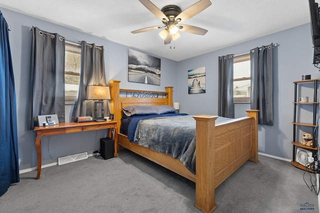 carpeted bedroom featuring ceiling fan