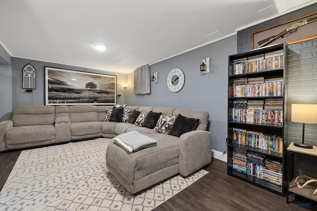 living room featuring crown molding and wood-type flooring