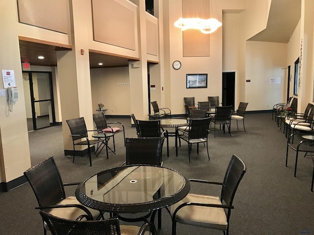 dining space with a high ceiling