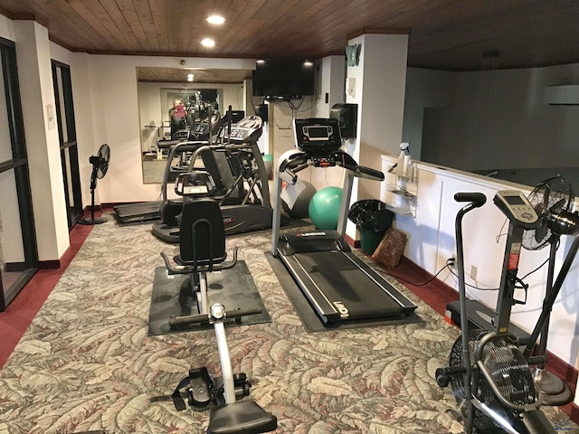 workout area featuring wood ceiling