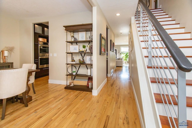 hall featuring light wood-type flooring