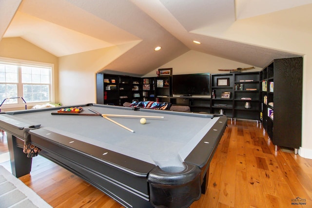 rec room featuring lofted ceiling and light hardwood / wood-style floors