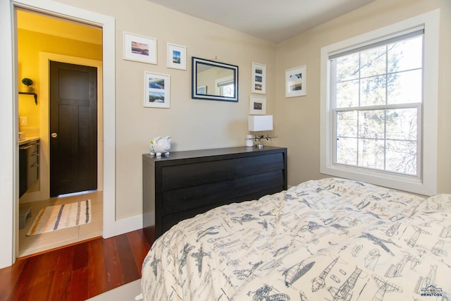 bedroom featuring hardwood / wood-style flooring