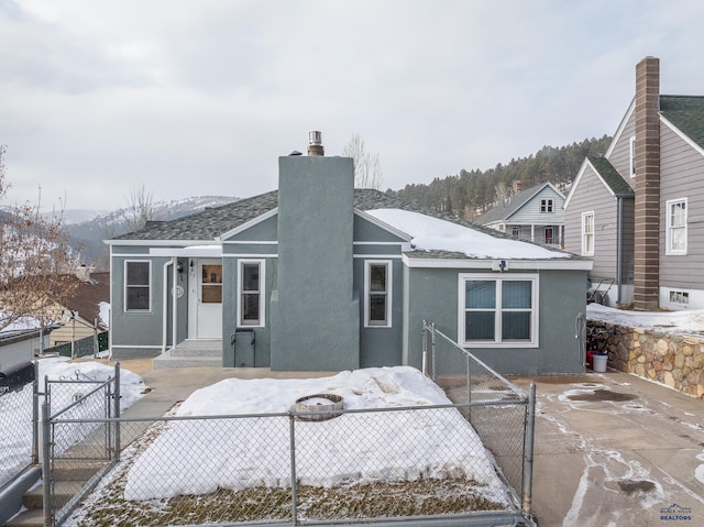 view of snow covered property