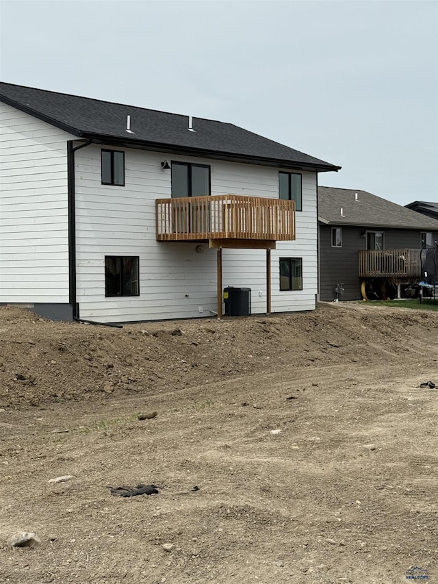 648 Valor Ct, Box Elder, SD 57719 - back of property featuring central AC unit