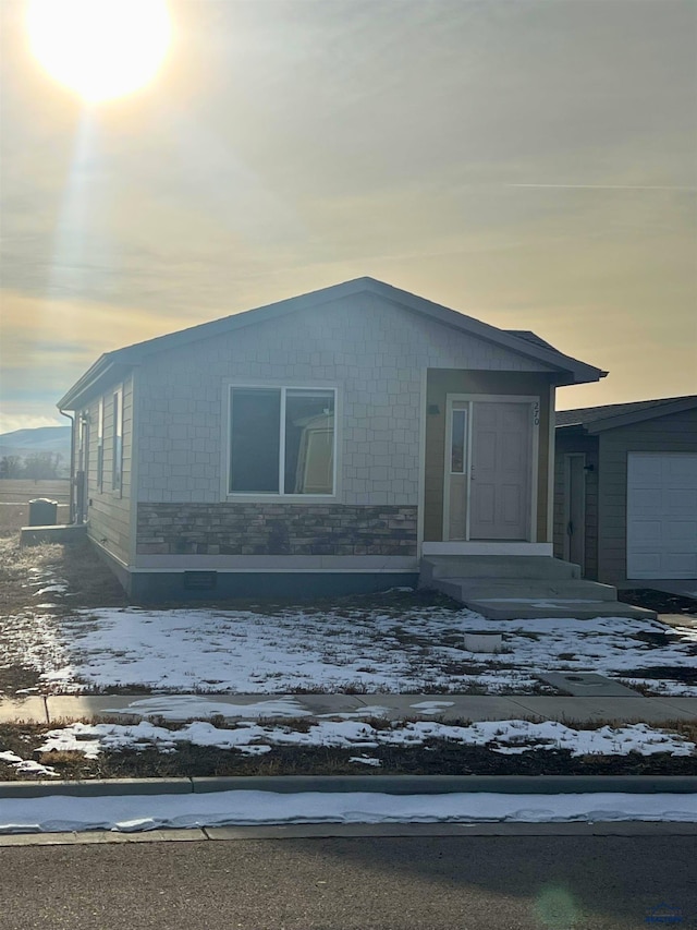 view of front of property featuring a garage