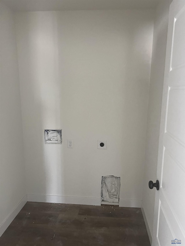 washroom with dark wood-type flooring and hookup for an electric dryer