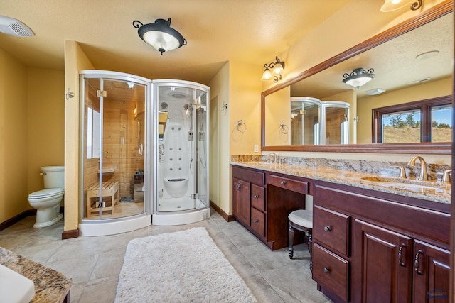 bathroom featuring vanity, an enclosed shower, a textured ceiling, and toilet