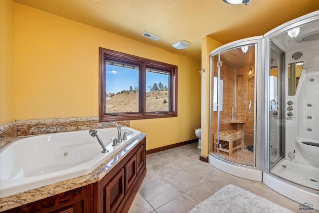 bathroom with independent shower and bath, a textured ceiling, and toilet